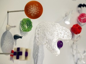 3D printed objects at the Science Museum exhibition. Experts have debated whether 3D printing can completely replace the manufacturing process, with many arguing that the technology is too expensive for that to happen